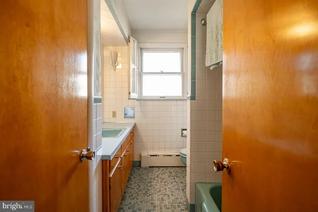 a bathroom with a sink and a bathtub