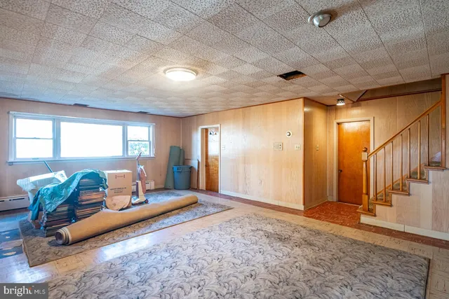 a pathway of a house with a yard