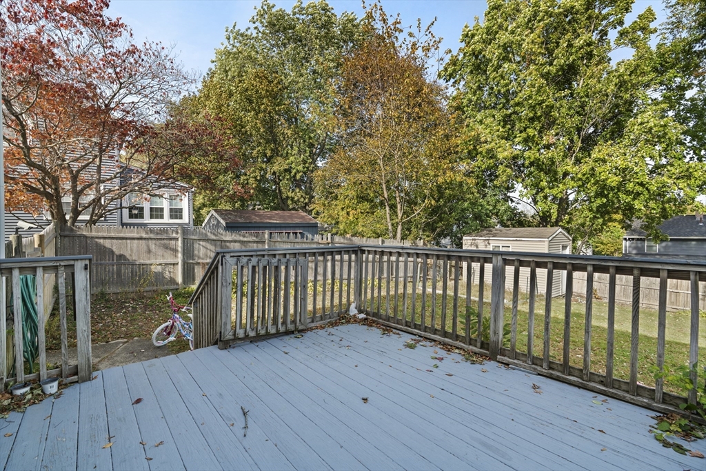19-21 Bursley Road Weymouth, MA 02191 - Photo 18 of 33 a view of deck with wooden floor and fence