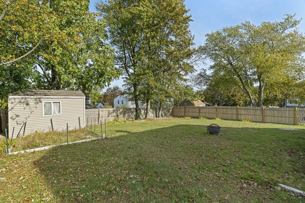 19-21 Bursley Road Weymouth, MA 02191 - Photo 20 of 33 a view of a backyard