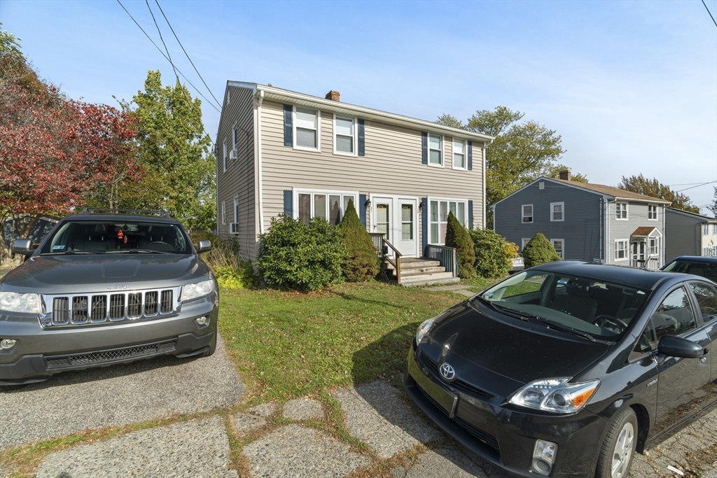 19-21 Bursley Road Weymouth, MA 02191 - Photo 3 of 33 a view of a house with a yard