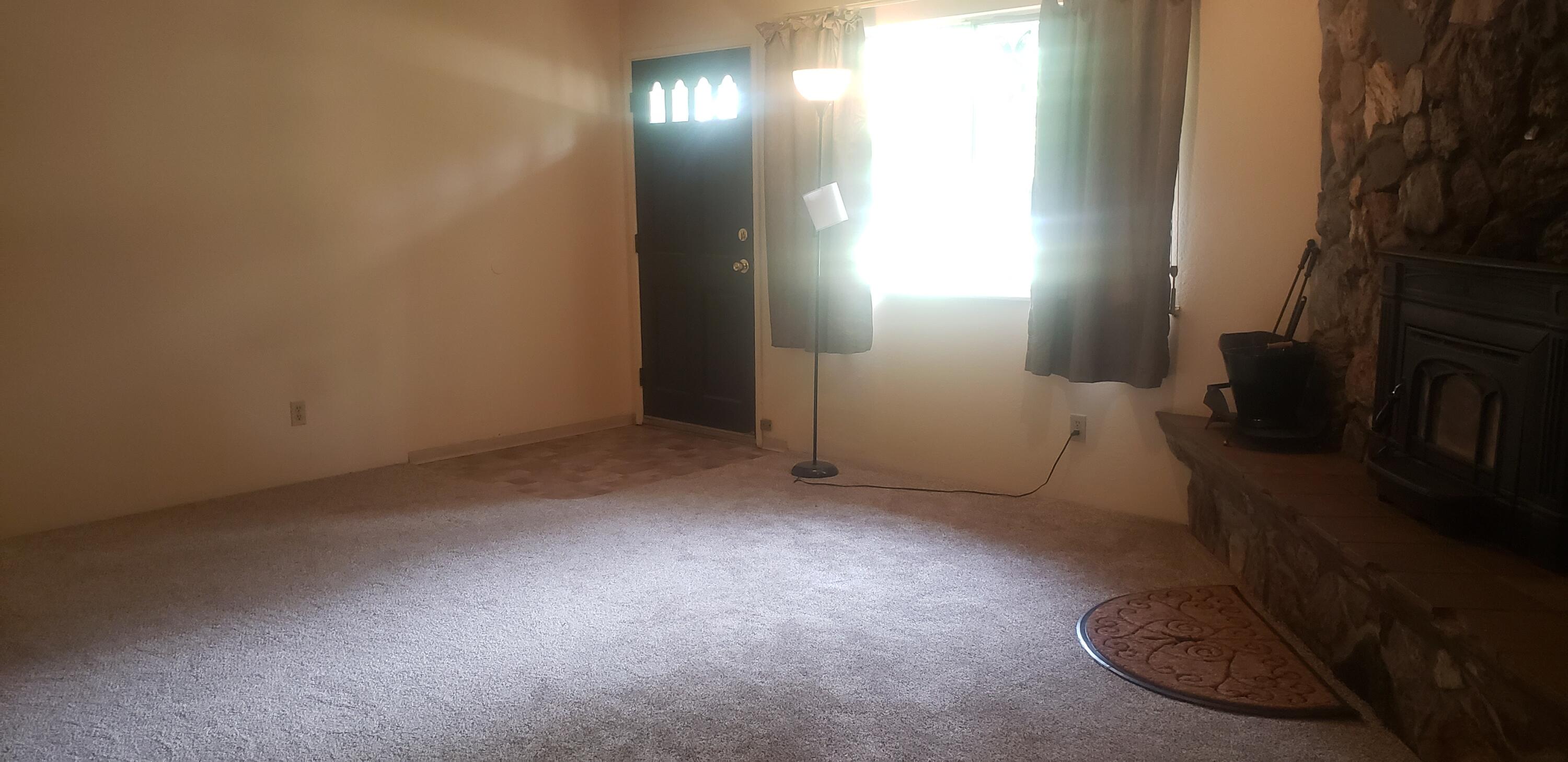 1424 Dick George Road Cave Junction, OR 97523 - Photo 6 of 22 living room-fireplce insert