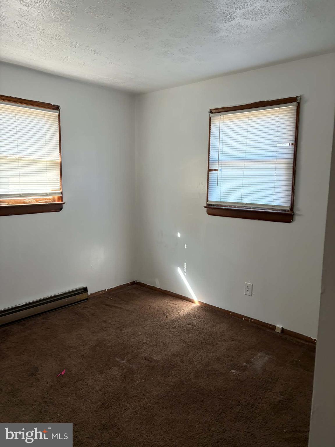 255 Redskins Lane Augusta, WV 26704 - Photo 17 of 35 an empty room with a window