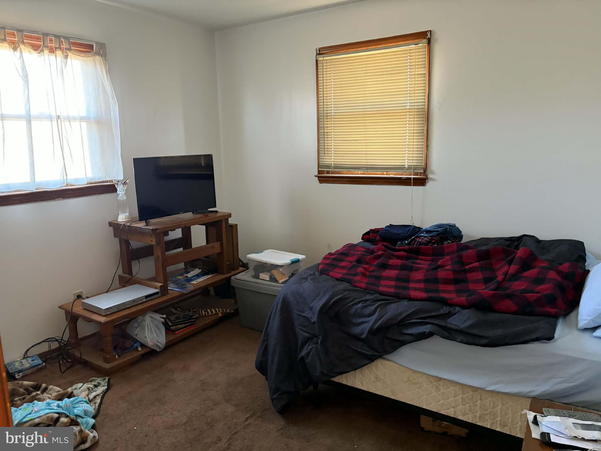 255 Redskins Lane Augusta, WV 26704 - Photo 22 of 35 a bedroom with a bed and a window