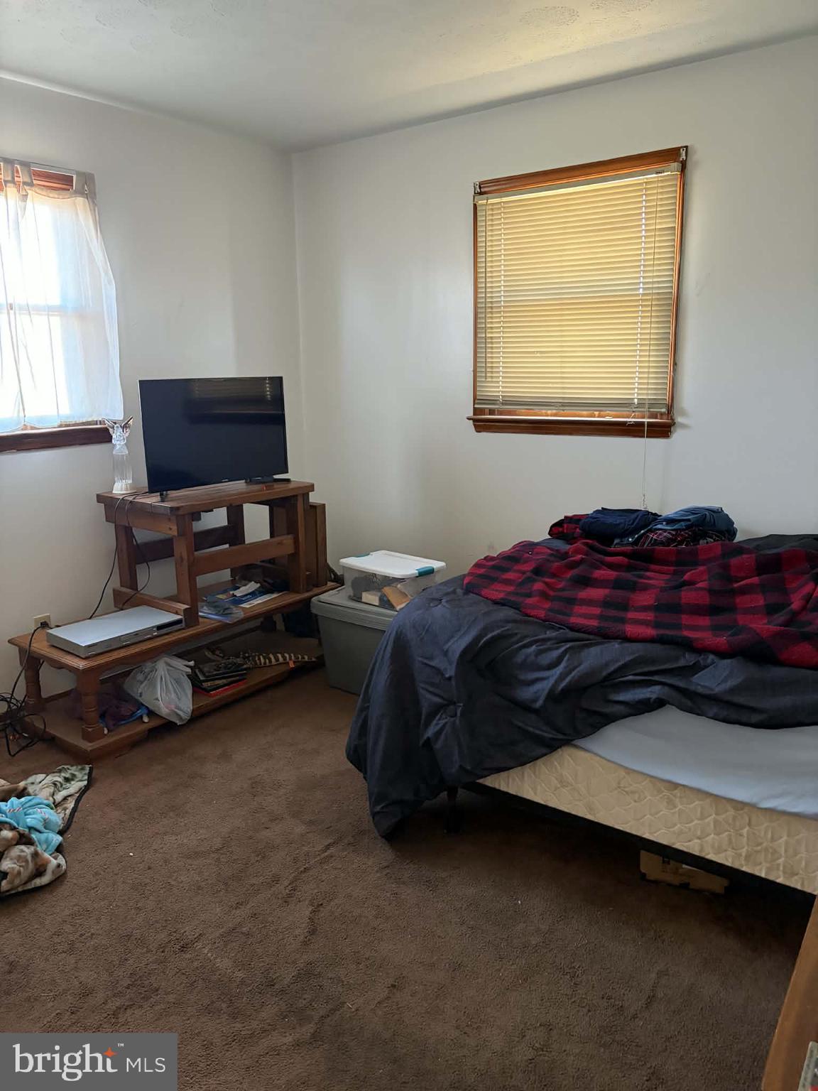 255 Redskins Lane Augusta, WV 26704 - Photo 23 of 35 a bedroom with a bed and a window