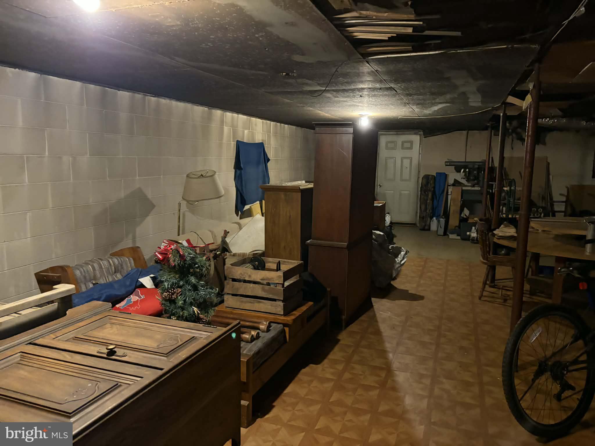 255 Redskins Lane Augusta, WV 26704 - Photo 32 of 35 a room with gym equipment and a view of living room