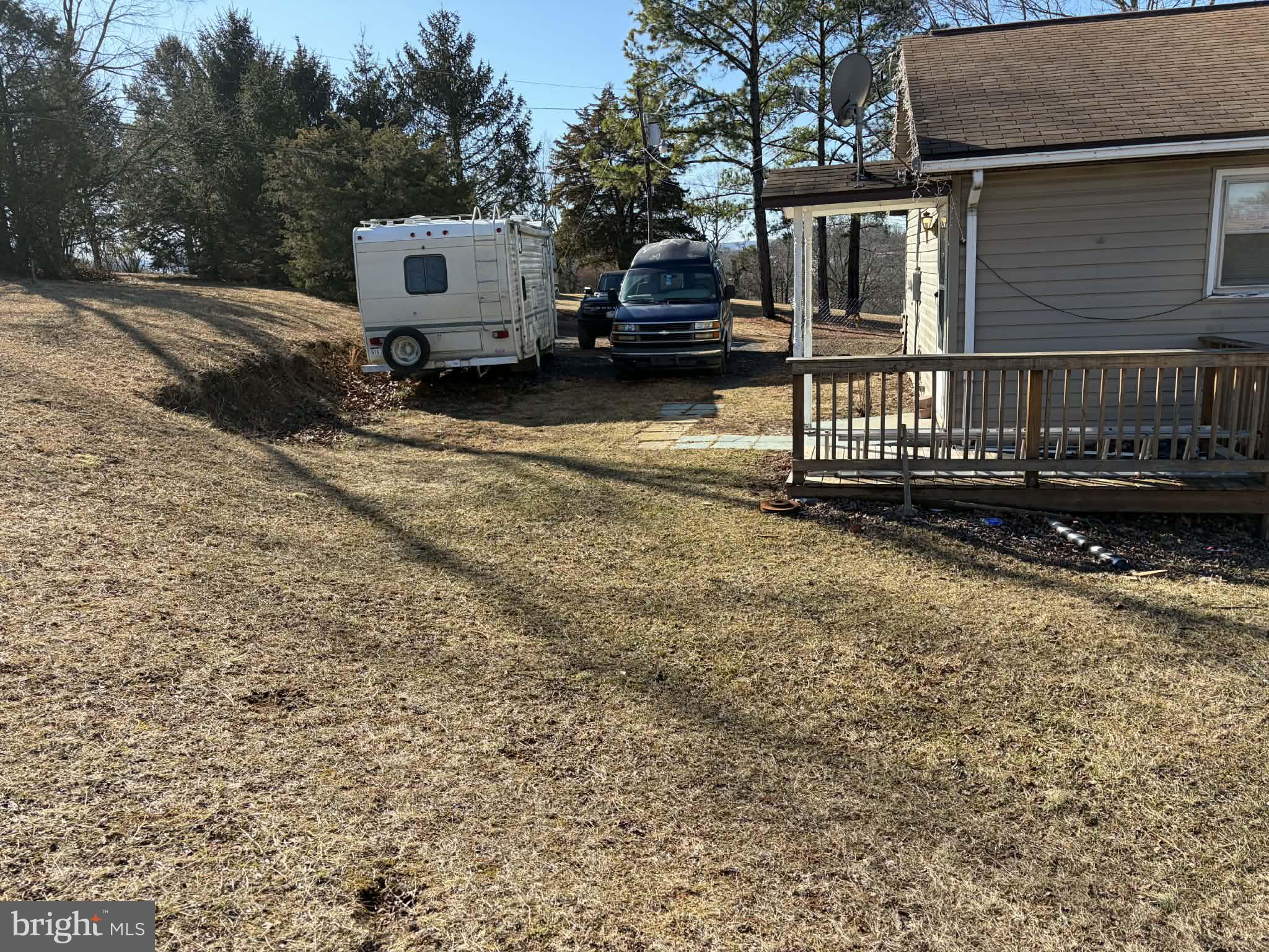 255 Redskins Lane Augusta, WV 26704 - Photo 4 of 35 a view of a house with wooden fence