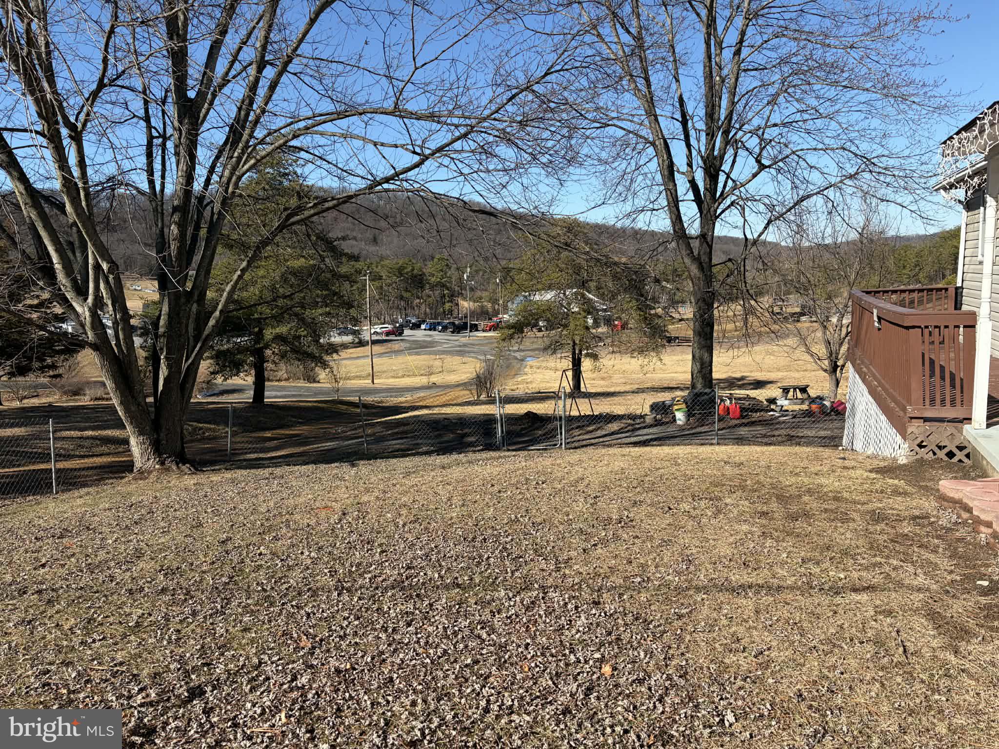 255 Redskins Lane Augusta, WV 26704 - Photo 5 of 35 a view of a yard with wooden fence