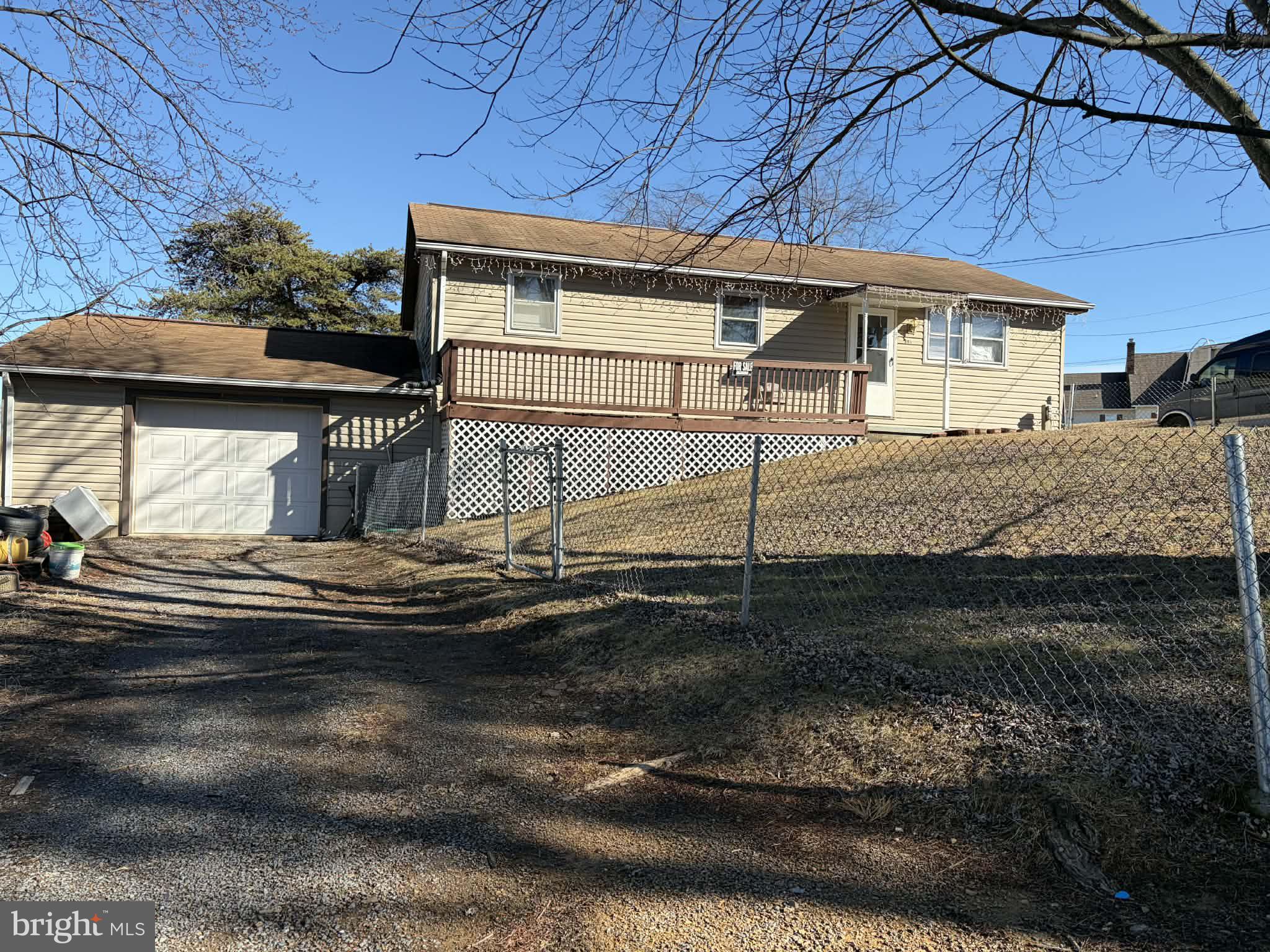 255 Redskins Lane Augusta, WV 26704 - Photo 7 of 35 a front view of a house with a yard