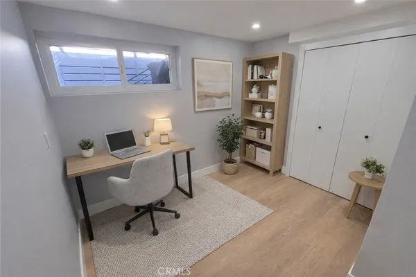 a workspace with furniture and window