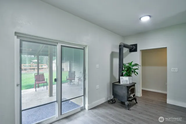 a workspace with furniture and a potted plant