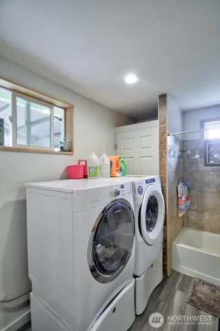 a utility room with dryer and washer