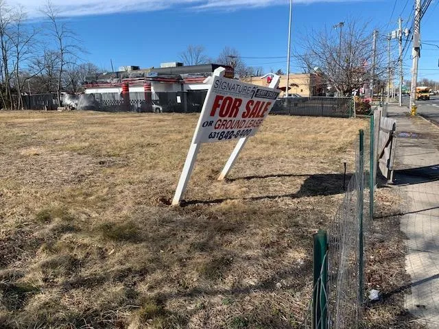a view of outdoor space with garden and seating area