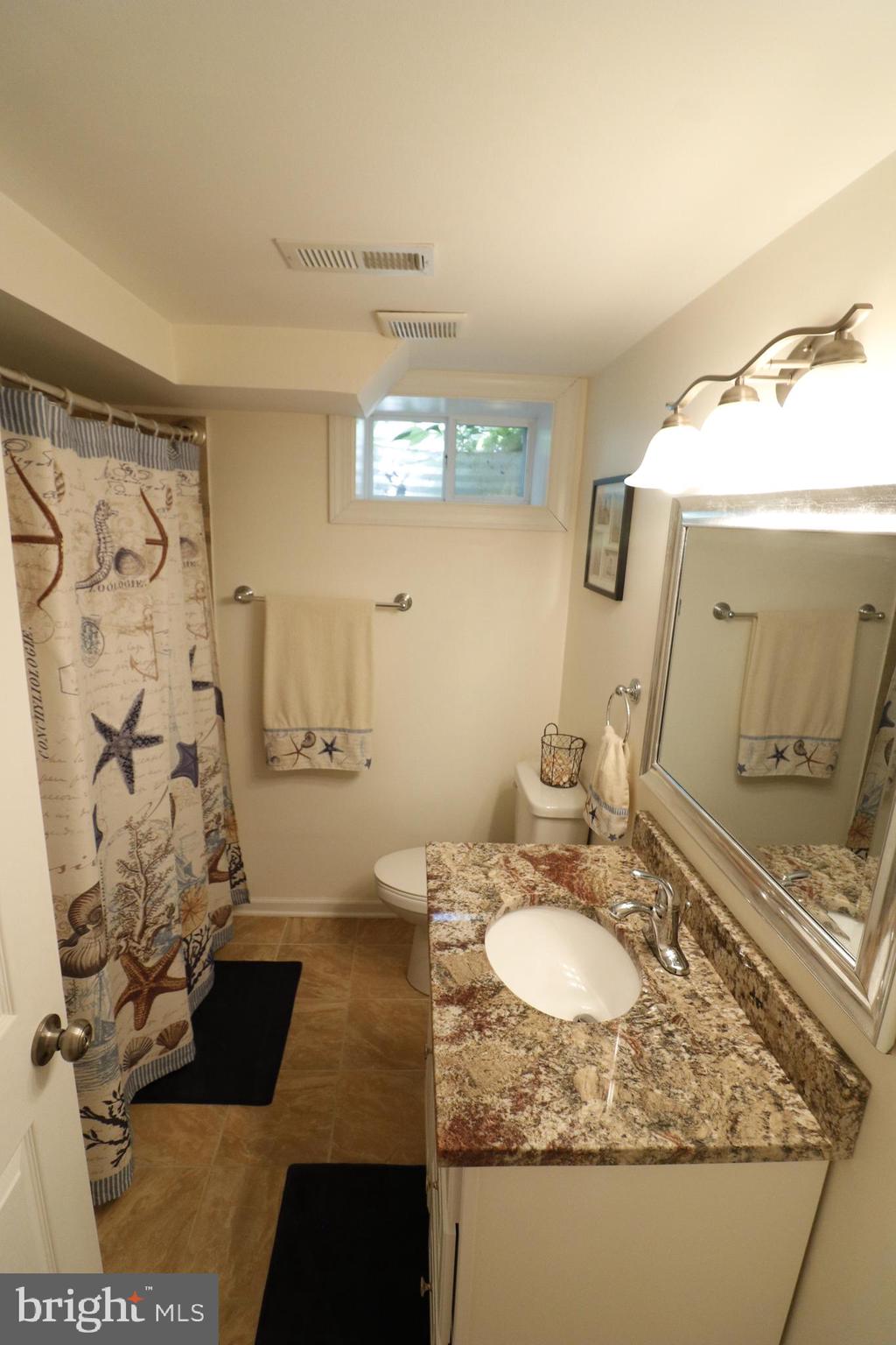 8601 Saddler Road Baltimore, MD 21234 - Photo 18 of 25 Completely renovated lower level bath