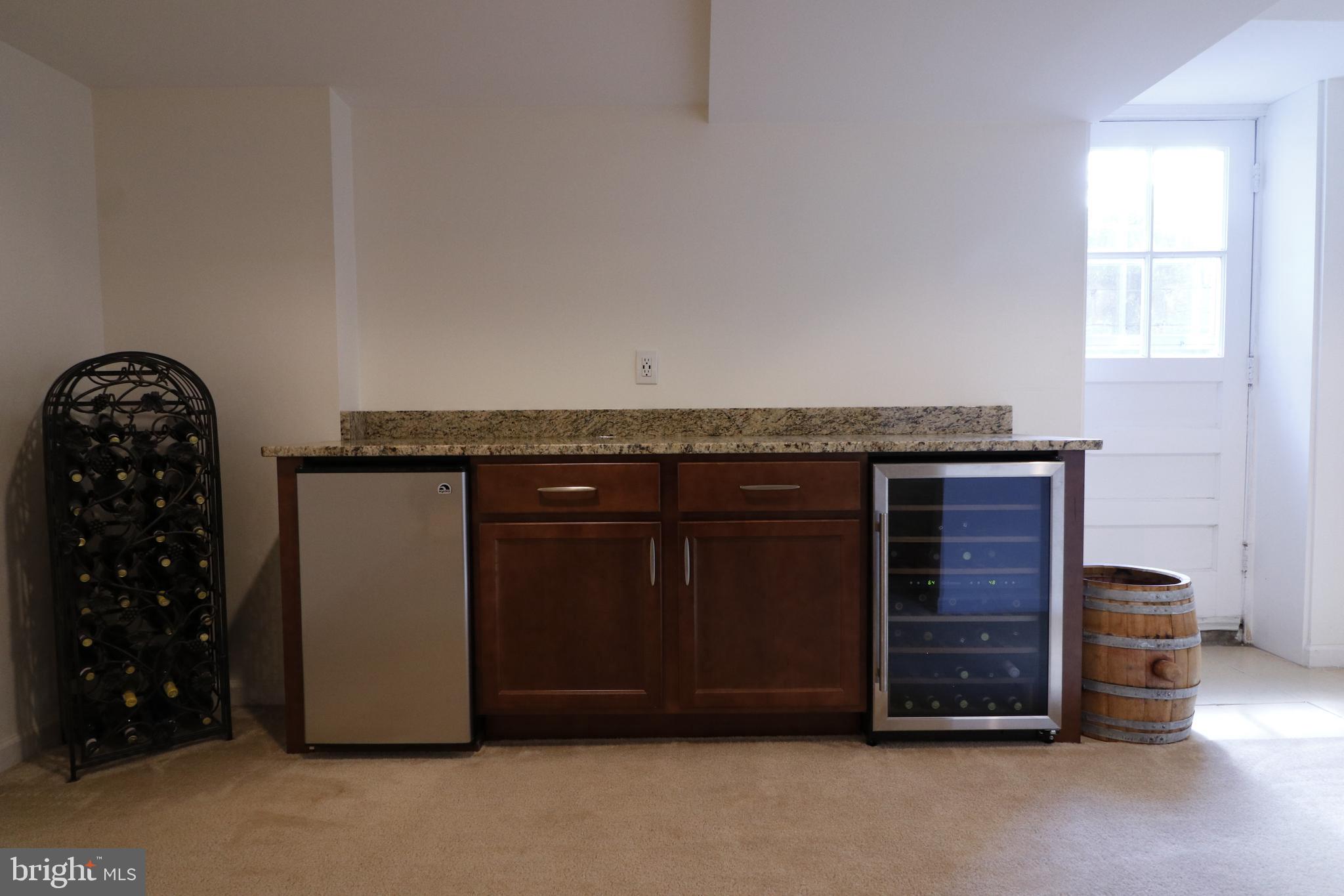 8601 Saddler Road Baltimore, MD 21234 - Photo 20 of 25 Entertainment bar with refrigerator