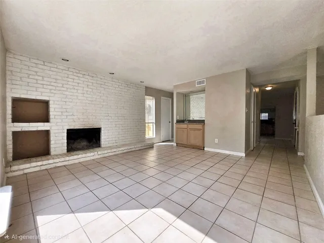 an empty room with windows and a fireplace