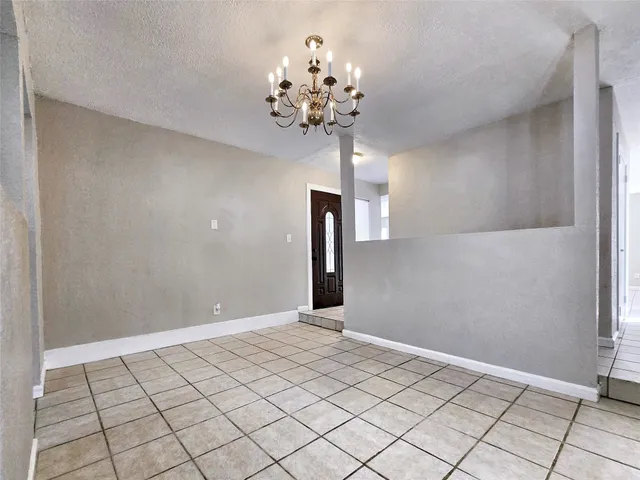 a view of a chandelier in a room