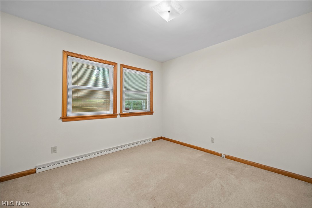 1740 Walnut Road Kent, OH 44240 - Photo 24 of 43 Neutral wall finishes complement the light-toned carpeting