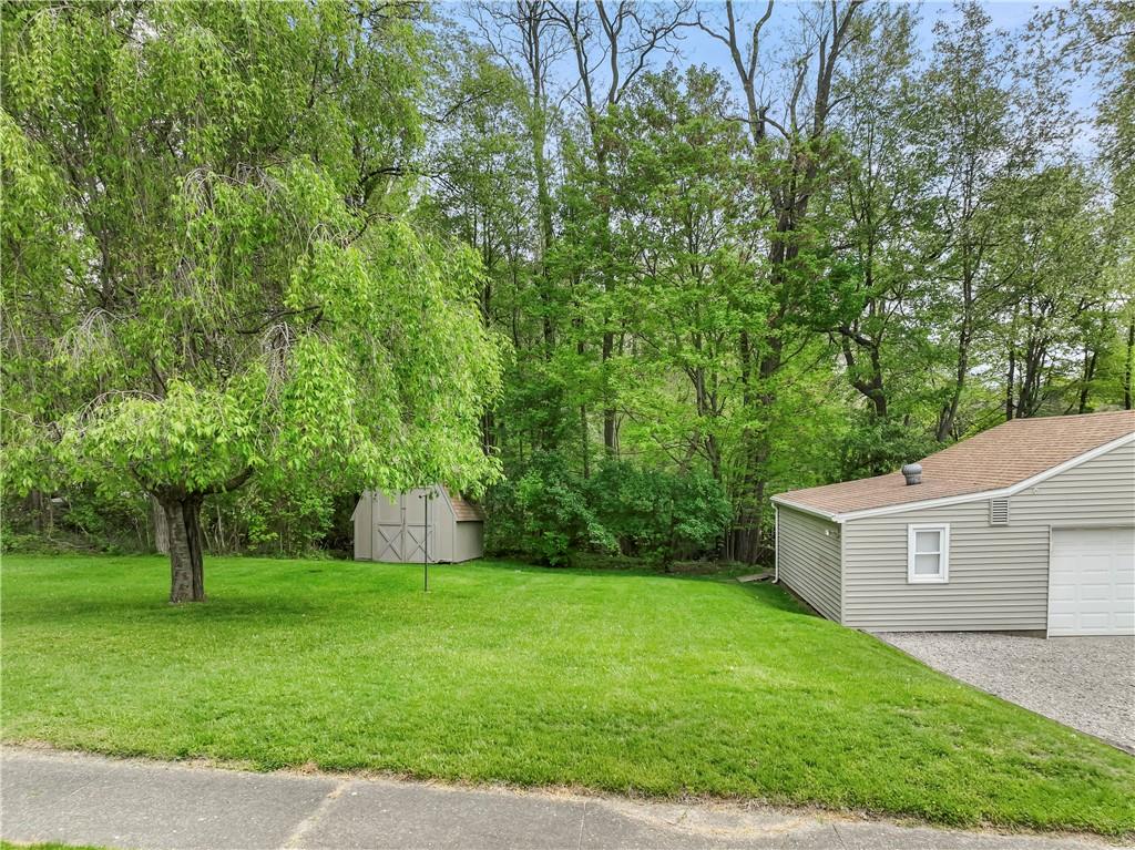 170 Neville Road Beaver, PA 15009 - Photo 4 of 19 side yard and shed adjoining garage.