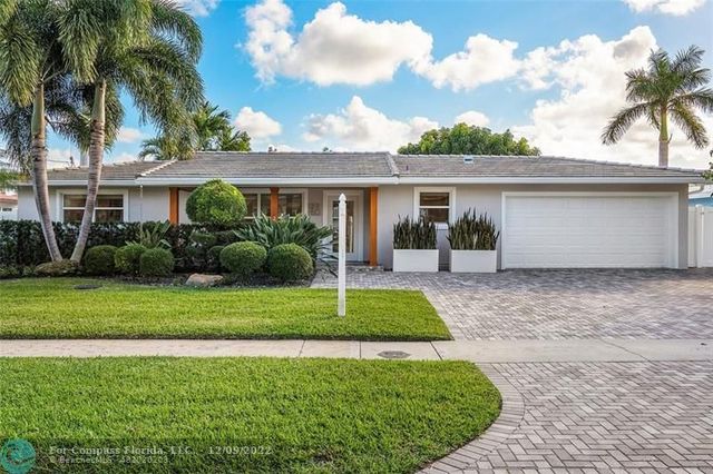 a view of swimming pool from a balcony