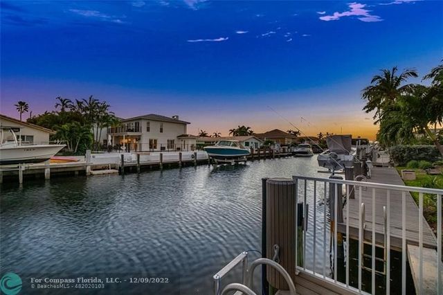 a view of a lake with boats