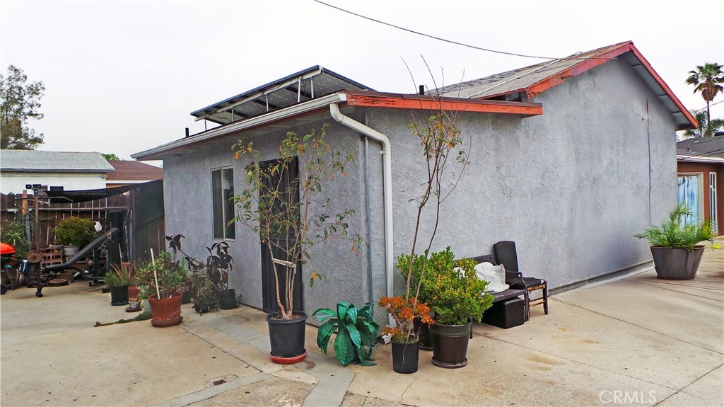 13912 Daventry Street Pacoima, CA 91331 - Photo 10 of 10 a view of a house with potted plants