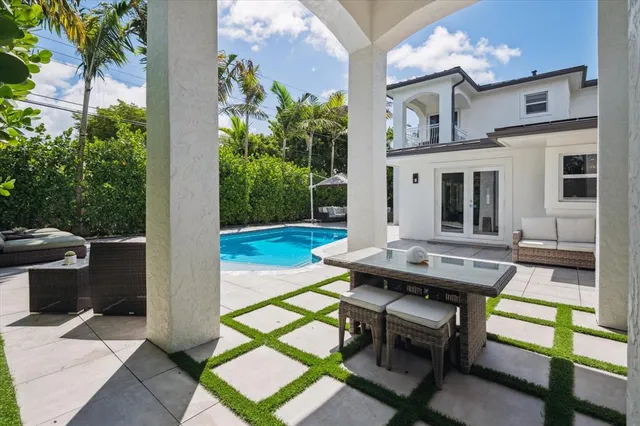 a view of backyard with seating space