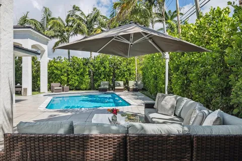 a building outdoor space with patio furniture