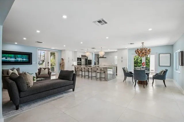 a living room with furniture and a table