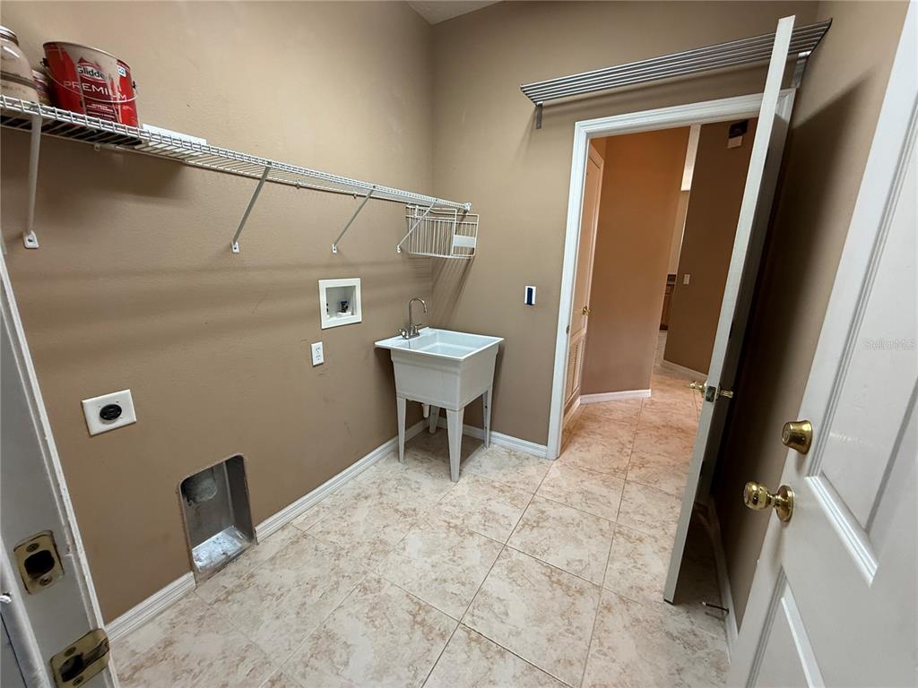 3231 Pawleys Loop North St. Cloud, FL 34769 - Photo 25 of 34 a bathroom with a sink and a toilet