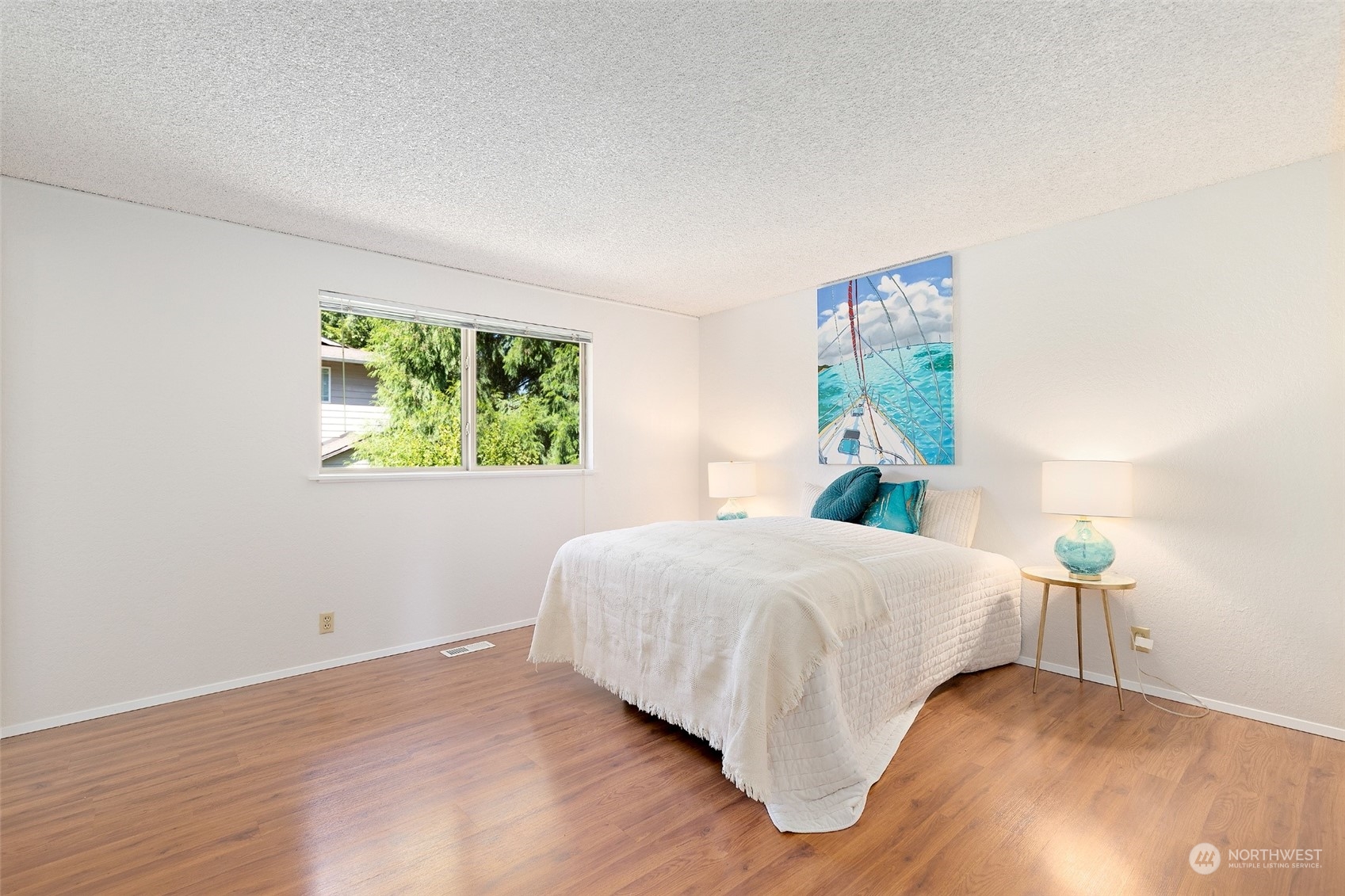 1229 206th Street Southeast Bothell, WA 98012 - Photo 14 of 40 a bedroom with a bed and a window