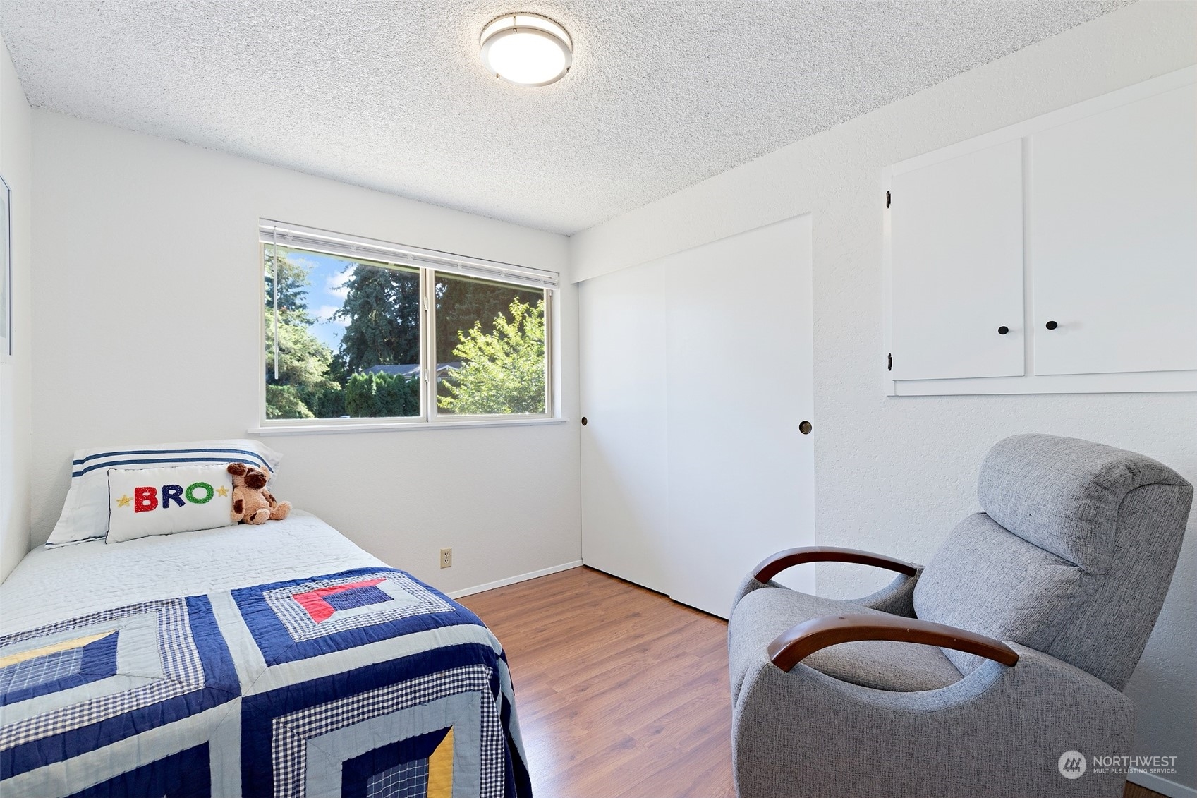 1229 206th Street Southeast Bothell, WA 98012 - Photo 18 of 40 a workspace with furniture and window