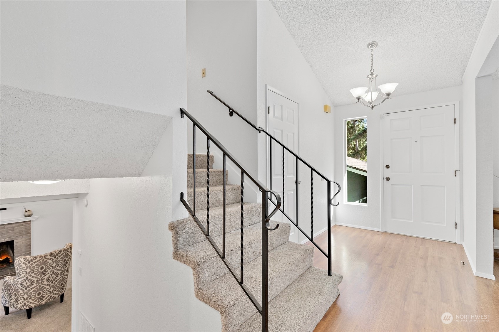 1229 206th Street Southeast Bothell, WA 98012 - Photo 21 of 40 a view of entryway and hall with wooden floor