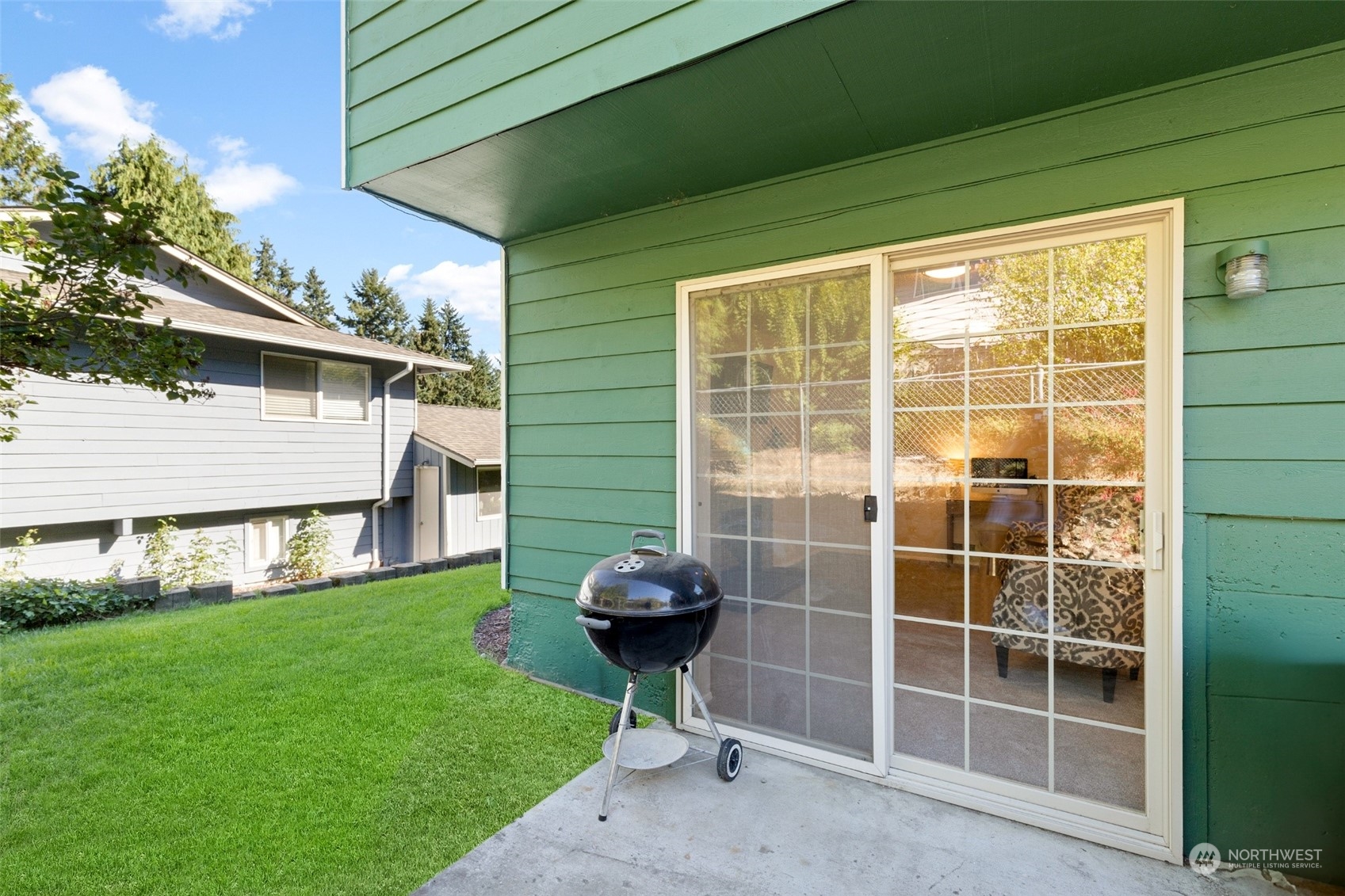 1229 206th Street Southeast Bothell, WA 98012 - Photo 31 of 40 a view of a backyard with a garden and entertaining space