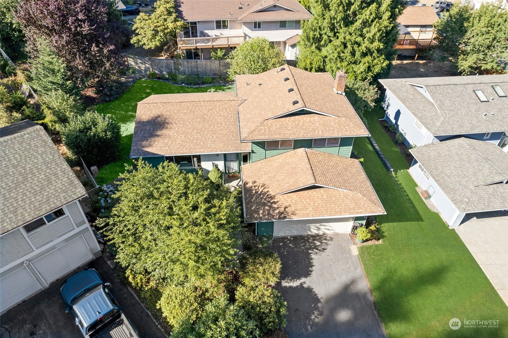 1229 206th Street Southeast Bothell, WA 98012 - Photo 36 of 40 an aerial view of a house with swimming pool and garden