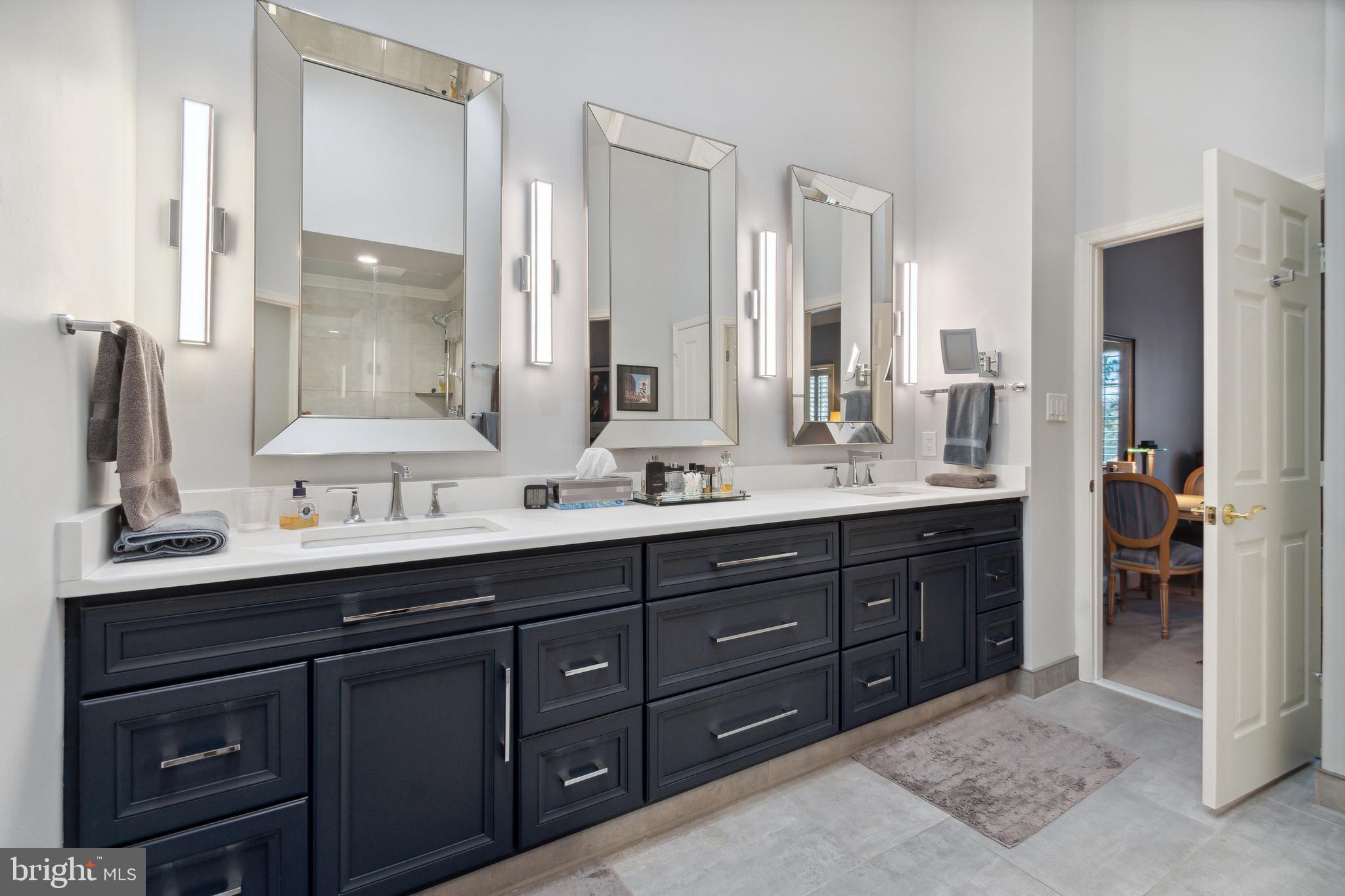 3737 Winfield Lane Northwest Washington, DC 20007 - Photo 36 of 54 Mirrors, Lighting, Skylight create Bright Setting