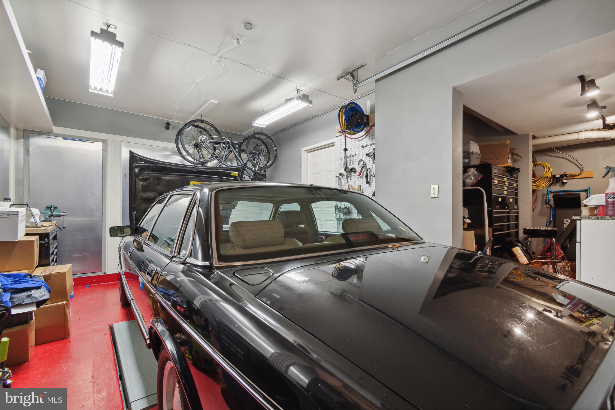 3737 Winfield Lane Northwest Washington, DC 20007 - Photo 51 of 54 Sophisticated Garage with Hydraulic Lift