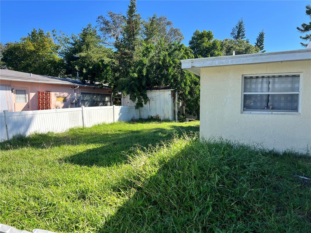 5323 Carlton Road New Port Richey, FL 34652 - Photo 11 of 11 a view of a house with a yard