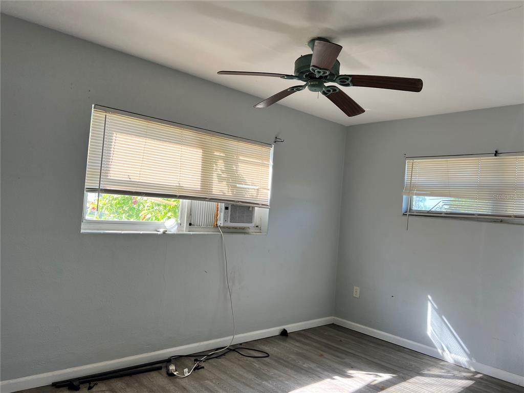 5323 Carlton Road New Port Richey, FL 34652 - Photo 6 of 11 a view of empty room with window