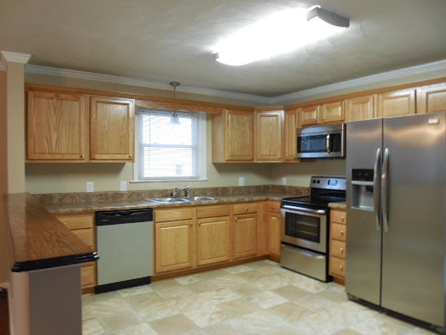 2371 Rutrough Road Southeast Roanoke, VA 24014 - Photo 12 of 34 a kitchen with stainless steel appliances granite countertop a stove top oven a sink and dishwasher