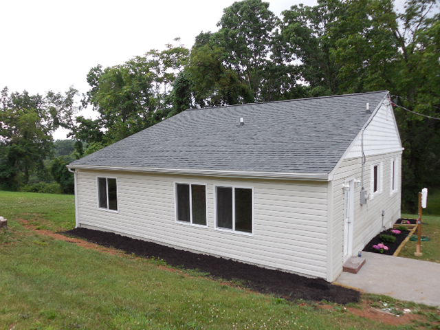 2371 Rutrough Road Southeast Roanoke, VA 24014 - Photo 29 of 34 a view of a house with a backyard