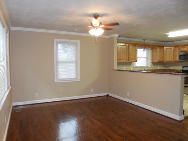 2371 Rutrough Road Southeast Roanoke, VA 24014 - Photo 4 of 34 a view of a kitchen with wooden floor and a window