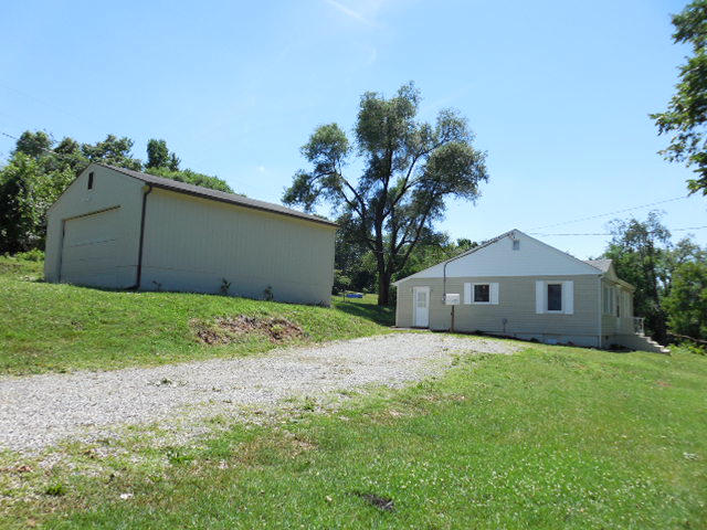 2371 Rutrough Road Southeast Roanoke, VA 24014 - Photo 31 of 34 a front view of house with yard and trees
