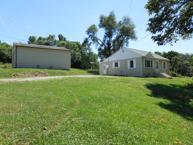 2371 Rutrough Road Southeast Roanoke, VA 24014 - Photo 33 of 34 a front view of house with yard and green space