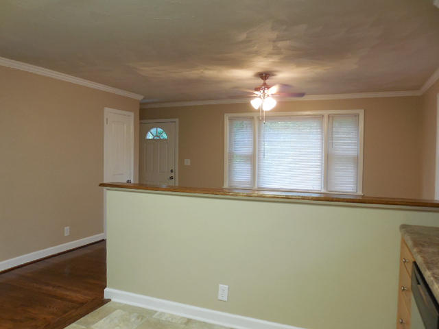 2371 Rutrough Road Southeast Roanoke, VA 24014 - Photo 8 of 34 a view of a room with a ceiling fan and a window