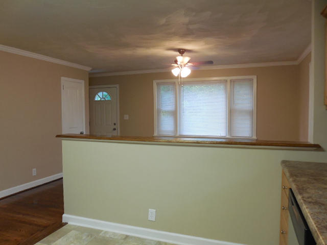 2371 Rutrough Road Southeast Roanoke, VA 24014 - Photo 9 of 34 view of an empty room with window and chandelier fan