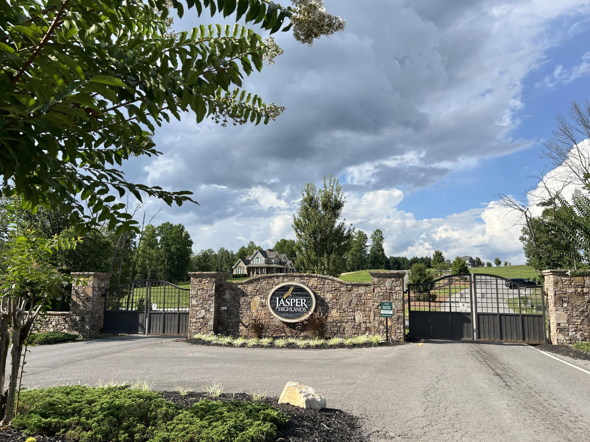 81 Crockett Loop Jasper, TN 37347 - Photo 23 of 35 a view of a street with a cars parked beside