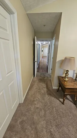 a view of a room with a bench