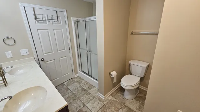a bathroom with a sink and toilet