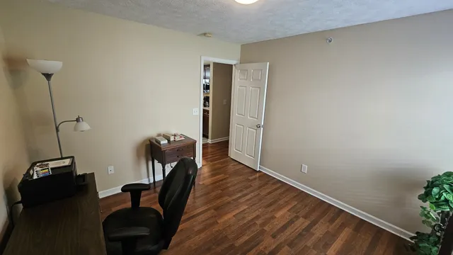 a view of a hallway with workspace